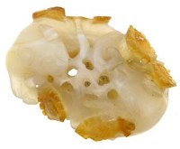 Lot 571 - Pierced jade two cats.