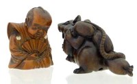Lot 573 - Two wooden Netsukes.