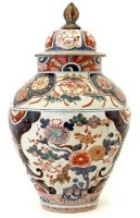 Lot 596 - 18th century Imari vase and cover.