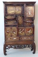 Lot 600 - Japanese lacquered cabinet.