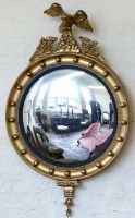 Lot 838 - Regency style gilt wood and gesso wall mirror