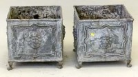 Lot 856 - Pair of cast lead square planters raised on paw feet
