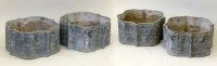 Lot 857 - Set of four cast lead quatrefoil planters