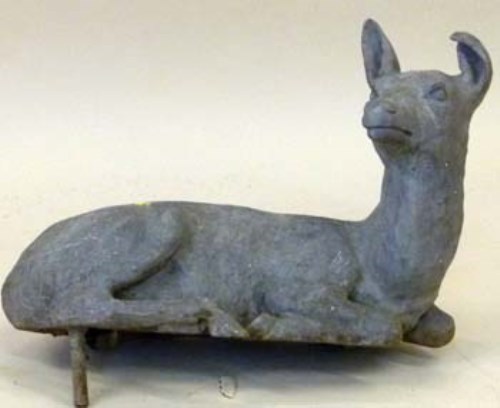 Lot 858 - Cast lead figure of a resting Deer
