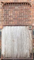 Lot 860 - Cast iron and wooden stable door.