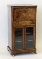 Lot 878 - Victorian walnut music cabinet.