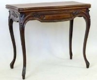 Lot 879 - Rosewood fold-over card table.