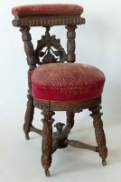 Lot 927 - Low Countries carved oak 'cock fighting' reading chair, circa. 1880