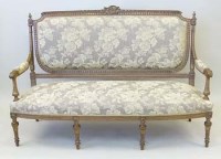Lot 938 - Louie XVI style walnut and parcel gilt show frame settee