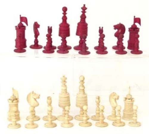 Lot 10 - Turned bone red & white chess set missing one