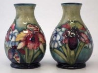 Lot 185 - Moorcroft orchid pair of vases.