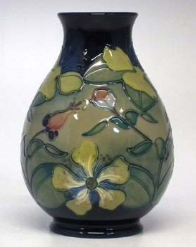 Lot 192 - Moorcroft hypericum vase.