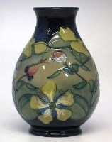 Lot 192 - Moorcroft hypericum vase.