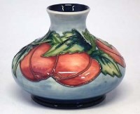 Lot 214 - Moorcroft plums vase