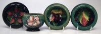 Lot 216 - Three Moorcroft dishes,  decorated with