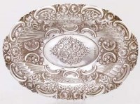 Lot 292 - Embossed silver dish.