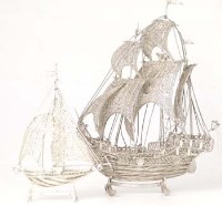 Lot 303 - Two filigree silver models of boats.