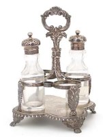 Lot 311 - George III silver four bottle cruet with two