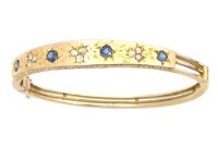 Lot 337 - Sapphire and diamond hinged bangle on unmarked