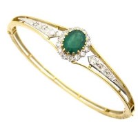 Lot 341 - Emerald and diamond hinged bangle, the half hoop