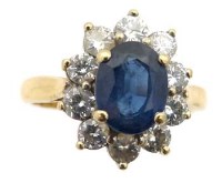 Lot 370 - 18ct gold sapphire and diamond cluster ring.