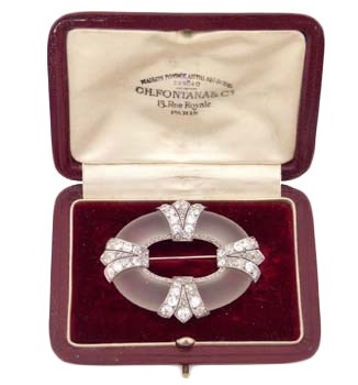 Lot 387 - An early 20th century rock crystal and diamond brooch by C.H. Fontana & Cie