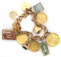 Lot 390 - Gold charm bracelet
