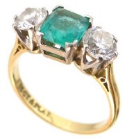 Lot 408 - 18ct gold emerald and diamond three stone ring
