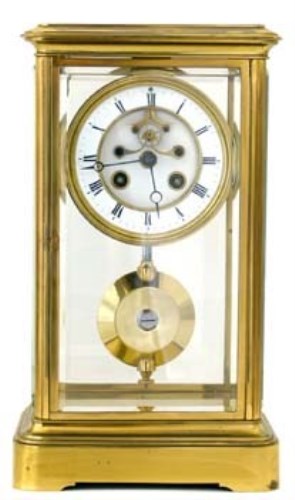 Lot 658 - Four glass mantel clock.
