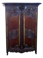 Lot 408 - Early 19th century French carved oak armoire.