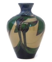 Lot 144 - Moorcroft green trial vase