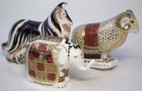 Lot 166 - Three Royal Crown Derby paperweights.