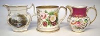 Lot 187 - Two named jugs and a large tankard.