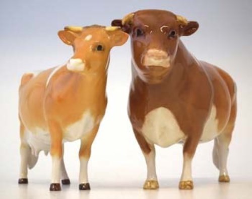 Lot 114 - Beswick Guernsey cow and calf.