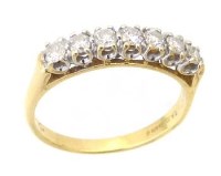 Lot 199 - 18ct (750) seven-stone half hoop ring, indicated