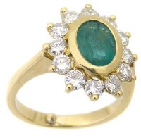 Lot 210 - Emerald and diamond oval cluster ring in unmarked