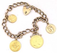 Lot 218 - 9ct gold bracelet set with two coins and two