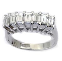 Lot 221 - 18ct white gold ring set with seven baguette