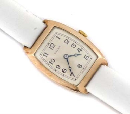 Lot 227 - Rolex gold tonneau cased wristwatch.