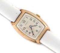 Lot 227 - Rolex gold tonneau cased wristwatch.