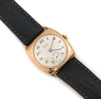 Lot 228 - Record gold cased wrist watch.
