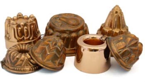 Lot 21 - 7 copper jelly moulds.