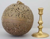 Lot 44 - 18th century pierced brass sphere and a candlestick
