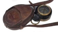 Lot 95 - Military compass in leather case.