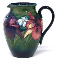 Lot 184 - Moorcroft orchid pattern jug.