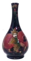 Lot 190 - Moorcroft pommegranate vase.