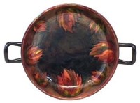 Lot 196 - Moorcroft flambe leaf and berry bowl.