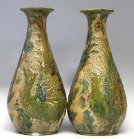Lot 212 - Pair of Brammam vases dated 1899.