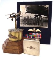Lot 128 - Trench art trophy, cigarette case and framed photo