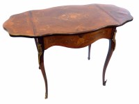 Lot 546 - Late 19th century French rosewood veneered centre table, top with quarted veneers, cross banding and floral marquetry inlays, two drop leaves, frieze drawer, French leg with ormolu mounts...